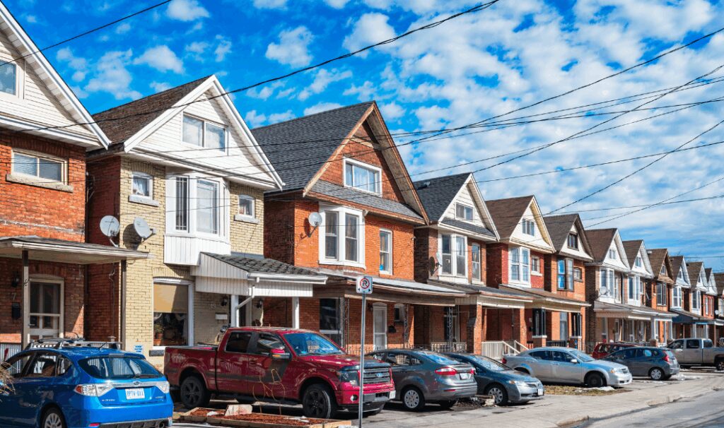 Terraced houses along a residential street, reflecting potential property market changes after a base rate cut in 2026.