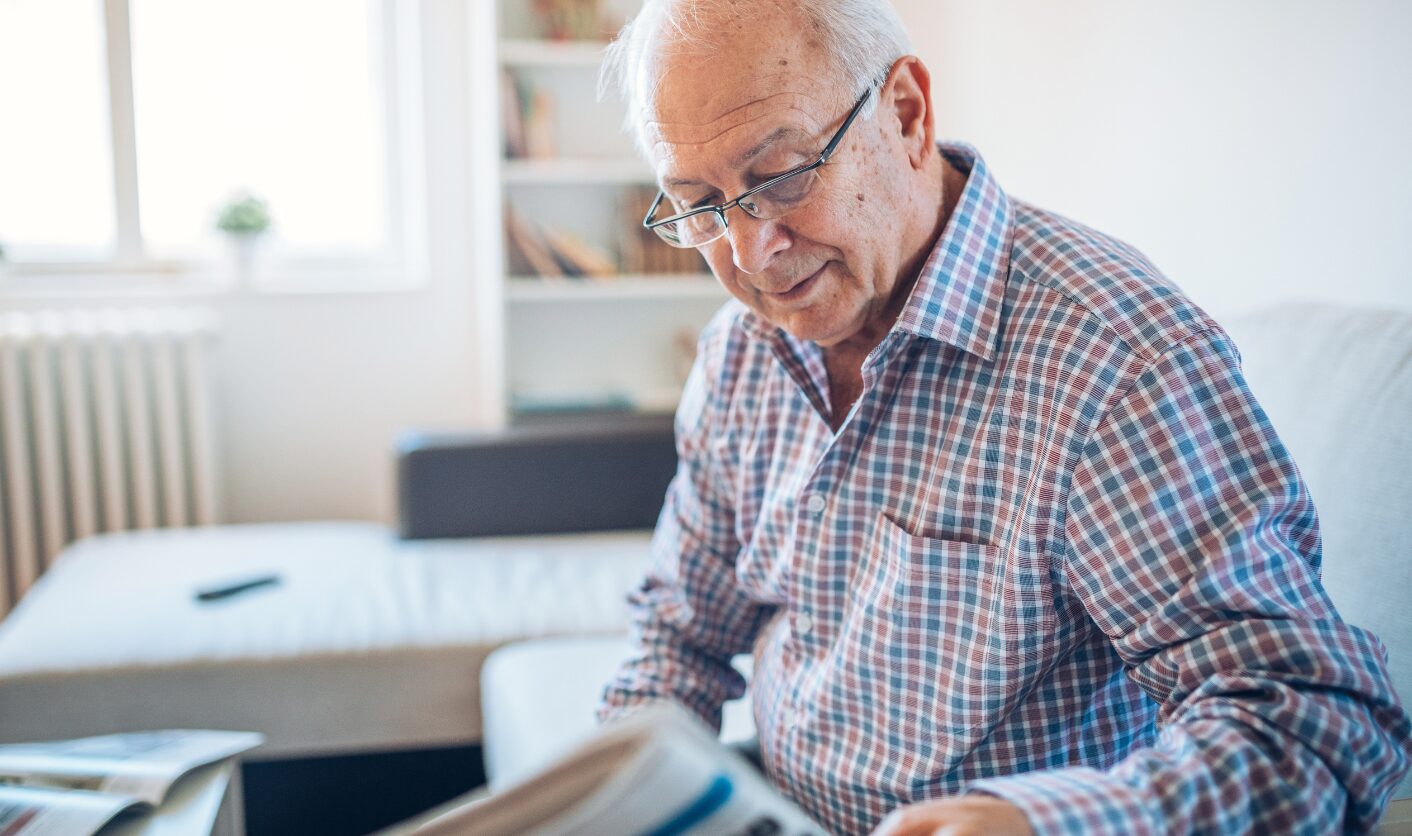 Landlord reviewing tenancy documents before selling a rental property